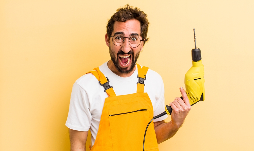 happy man, power drill, home repairs
