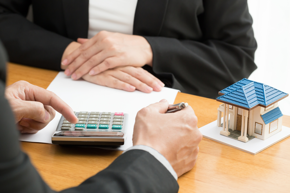 looking at calculator, real estate loan, home loan
