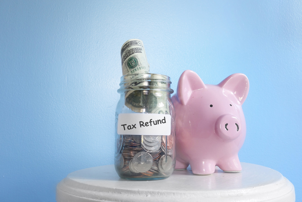 piggy bank, jar with cash, tax refund, real estate